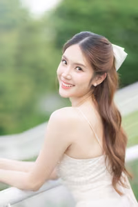 XVG No.19: Radiant Bride: Beautiful Woman in Elegant White Gown with a Joyful Smile in Lush Green Setting.-19