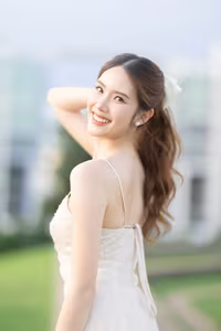 XVG No.19: Radiant Bride: Beautiful Woman in Elegant White Gown with a Joyful Smile in Lush Green Setting.-25