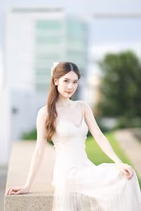 XVG No.19: Radiant Bride: Beautiful Woman in Elegant White Gown with a Joyful Smile in Lush Green Setting.-13