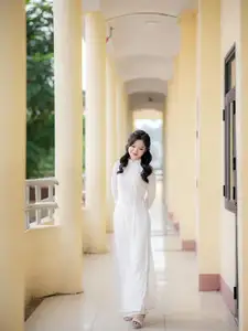 Discover the Timeless Charm of a Vietnamese Girl in Elegant White Ao Dai-7