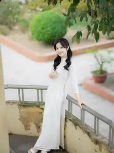 Discover the Timeless Charm of a Vietnamese Girl in Elegant White Ao Dai-9