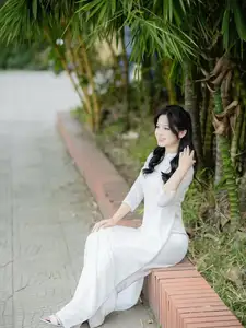 Discover the Timeless Charm of a Vietnamese Girl in Elegant White Ao Dai-5