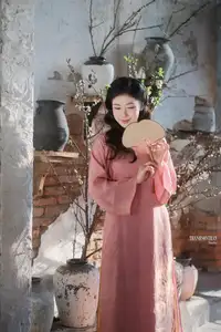 Serene Beauty of a Lady in Pink Traditional Dress with Spring Blossoms-11