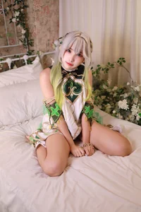 Ethereal Wisdom: Mumu Momo Captures the Divine Essence of Nahida in Stunning Cosplay-2