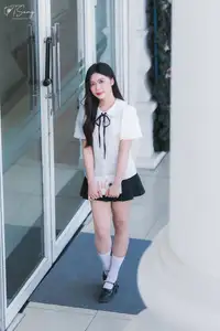 Charming Schoolgirl in Elegant Uniform: A Glimpse of Youthful Beauty-0