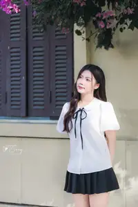 Charming Schoolgirl in Elegant Uniform: A Glimpse of Youthful Beauty-4