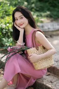 Captivating Grace: Long-Haired Beauty in Soft Pink Evokes Dreamy Serenity.-1