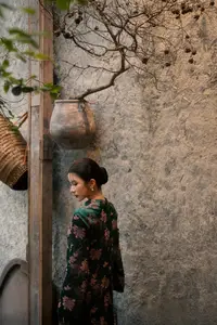 Elegant Asian Beauty: Serene Woman in Modernized Traditional Dress with Vintage Floral Vase-8