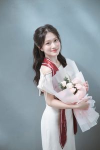 Radiant Student in Graduation Gown Captures Memorable Moment of Success and Joy for a Bright Future.-2