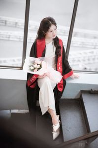 Radiant Student in Graduation Gown Captures Memorable Moment of Success and Joy for a Bright Future.-4
