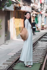 XVG No.52: Elegant Ao Dai Beauty in Hanoi Old Quarter Train Street Captivating Vietnamese Charm-3
