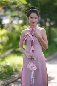 Gentle Charm: A Girl in an Elegant Pink Dress Amidst Nature's Embrace-5
