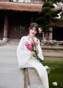 Elegant White Ao Dai with Pink Lotus Flower Embracing Cultural Heritage-10