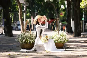 Vietnamese Ao Dai Beauty: Graceful girl with white daisies, an enchanting blend of tradition and charm.-6