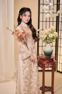 Graceful Vietnamese Woman Unveiled: Elegant Modern Ao Dai with Intricate Floral Patterns-4