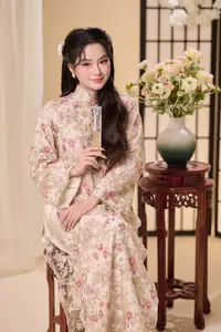 Graceful Vietnamese Woman Unveiled: Elegant Modern Ao Dai with Intricate Floral Patterns-12