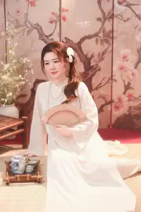 Graceful Asian Woman: Elegant Traditional Beauty in a Serene Tea Ceremony Moment.-3