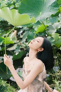 Li Yue in Tranquil Lotus Pond - YiTuYu Art Language Vol.8292: Natural Beauty and Serenity Amidst Green Lotus Leaves-2