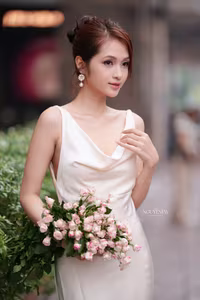 VGU No.11: Elegant Charm: A Woman's Grace in White Gown and Delicate Rose Bouquet-14
