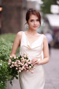 VGU No.11: Elegant Charm: A Woman's Grace in White Gown and Delicate Rose Bouquet-4
