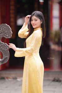 VGU No.132: Elegant Yellow Ao Dai Beauty Inspiring Vietnamese Cultural Grace-3