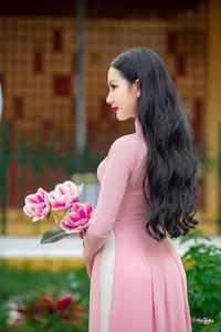 VGU No.158: Discover the Timeless Grace of Vietnamese Beauty in a Stunning Pink Ao Dai-8