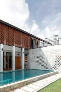 Modern Tropical 2-Story Home Design: The LP16 House Featuring North-South Ventilation, Private Pool, and Sustainable Wooden Louvers for Multi-Generational Living-3
