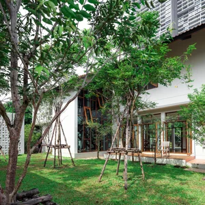 Modern Tropical 2-Story Home Design: The LP16 House Featuring North-South Ventilation, Private Pool, and Sustainable Wooden Louvers for Multi-Generational Living-9