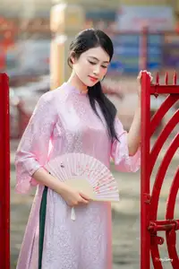 VGU No.163: The Graceful Beauty of a Vietnamese Girl in Traditional Pink Ao Dai Amidst Ancient Architecture-10