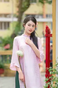 VGU No.163: The Graceful Beauty of a Vietnamese Girl in Traditional Pink Ao Dai Amidst Ancient Architecture-0