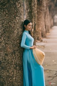 Graceful Vietnamese Woman in Blue Ao Dai Elegant Traditional Beauty-8