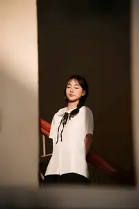 Gentle Beauty of a Young Woman in Golden Light: An Evocative Portrait.-2