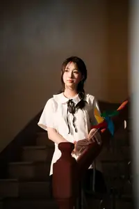 Gentle Beauty of a Young Woman in Golden Light: An Evocative Portrait.-3