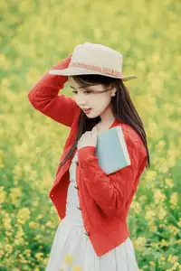 Gentle Beauty: A Girl in a Vibrant Rapeseed Flower Field, Spring Serenity-1