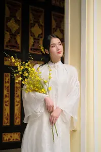 Vietnamese Beauty: Elegant Girl in White Ao Dai, Conical Hat with Yellow Flowers in Ancient Garden-6
