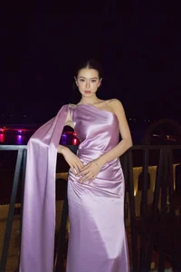 Do Yen Dan Radiates Sophistication in a Stunning Purple Silk Gown-0