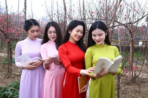 Hanoi Spring Vibes: Young Women in Traditional Ao Dai at Nhat Tan Peach Blossom Garden for Tet 2026-9