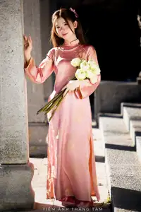 Captivating Serenity: Vietnamese Girl in Pink Ao Dai with Lotus Flowers1730591-30