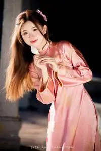 Captivating Serenity: Vietnamese Girl in Pink Ao Dai with Lotus Flowers1730591-25