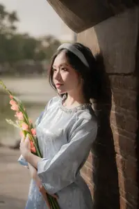 Serene Beauty: Vietnamese Young Woman by the Lake in Traditional Attire-2