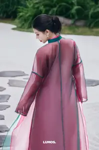 Graceful East Asian Beauty: Traditional Charm in a Lush Green Garden-5