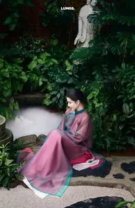 Graceful East Asian Beauty: Traditional Charm in a Lush Green Garden-17