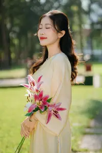 Serene Vietnamese Beauty in Ao Dai with Lilies: A Moment of Grace and Tranquility-0