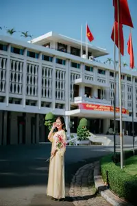 Serene Vietnamese Beauty in Ao Dai with Lilies: A Moment of Grace and Tranquility-6
