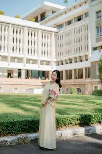 Serene Vietnamese Beauty in Ao Dai with Lilies: A Moment of Grace and Tranquility-9
