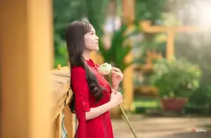 VGU No.188: Captivating Elegance: Vietnamese Beauty in Red Áo Dài with Sacred Lotus Flower.-4