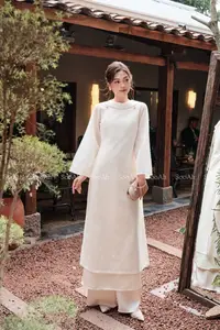 Elegant Vietnamese Muse: Graceful Modern Ao Dai in a Serene Setting-1