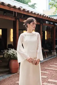 Elegant Vietnamese Muse: Graceful Modern Ao Dai in a Serene Setting-2