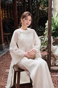Elegant Vietnamese Muse: Graceful Modern Ao Dai in a Serene Setting-3