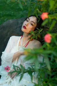 Elegant Woman in White Dress Amidst Lush Green Nature-0